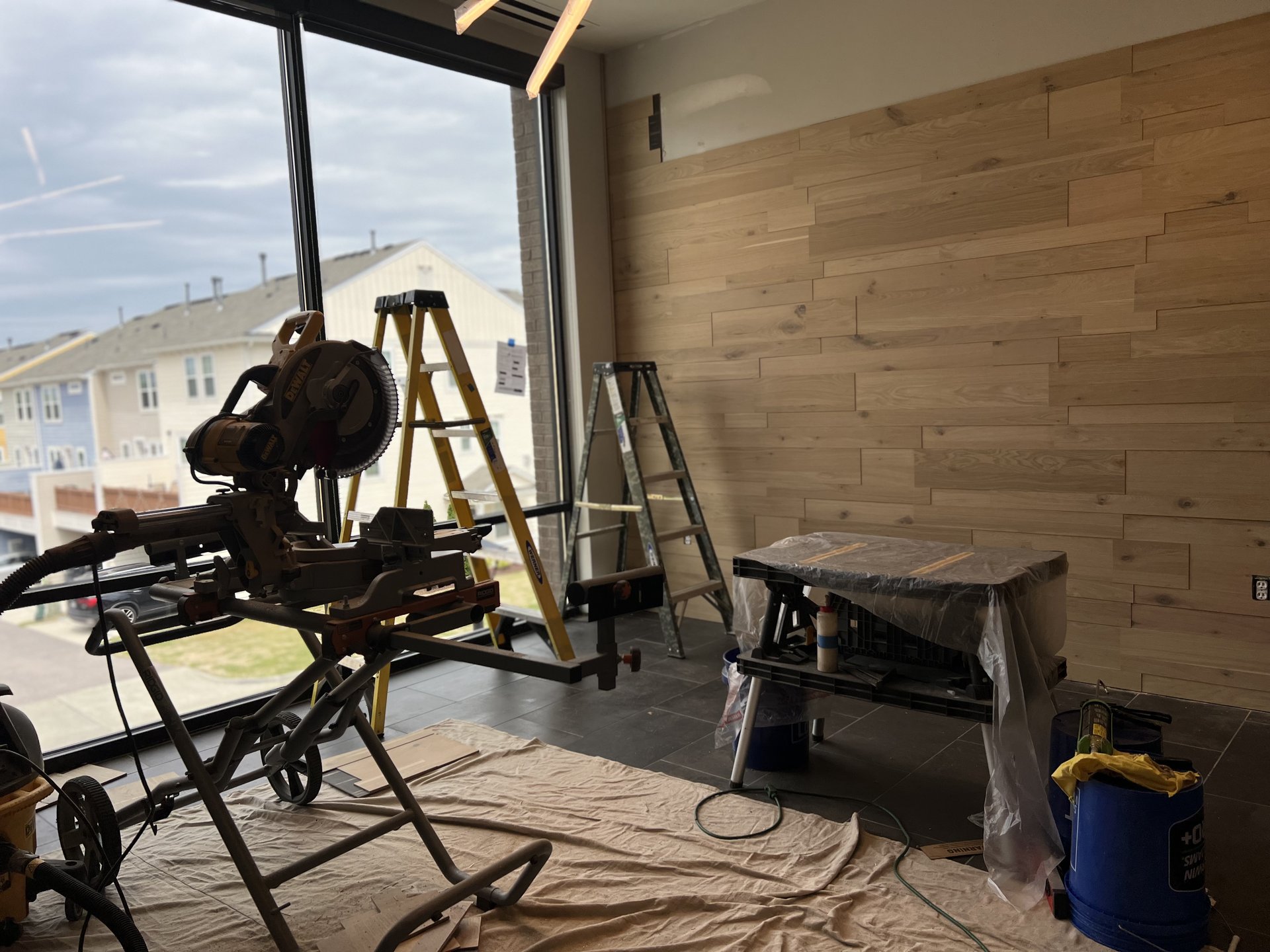 Wood accent wall paneling installation in commercial space